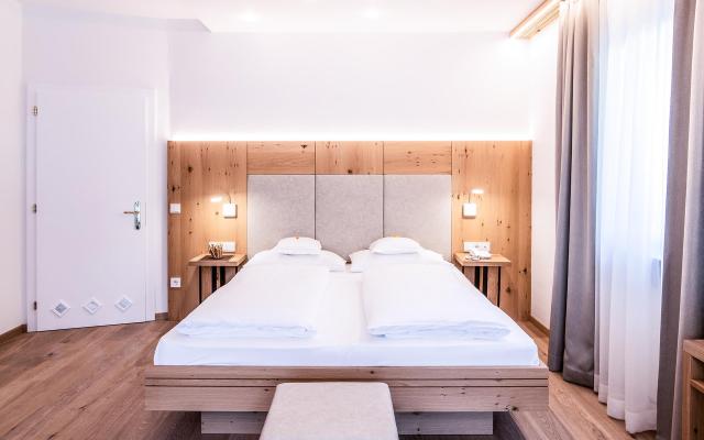 Schlafzimmer mit Doppelbett - Family Suite 31