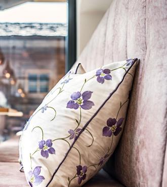 Couch with Throw Pillow in the Bar