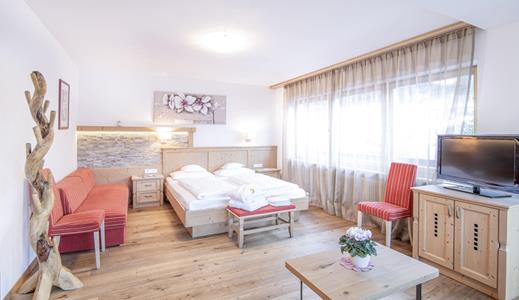 Schlafzimmer und Sitzecke - Suite Superior