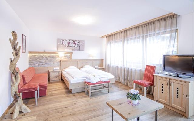 Schlafzimmer und Sitzecke - Suite Superior